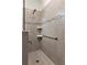 Modern bathroom features a walk-in shower with a rainfall shower head, grab bar, and decorative tile at 3710 Plymouth Dr, Winter Haven, FL 33884