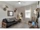Relaxing bedroom with futon, nature decor, ceiling fan and window providing natural light at 3710 Plymouth Dr, Winter Haven, FL 33884