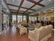 Elegant clubhouse lounge area featuring comfortable seating, large windows with water views, and stylish decor at 3710 Plymouth Dr, Winter Haven, FL 33884