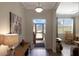 Open foyer with views to the front yard and living room with hardwood floors at 3710 Plymouth Dr, Winter Haven, FL 33884
