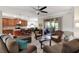 Cozy living room with tile floors flowing into the kitchen with breakfast bar seating at 3710 Plymouth Dr, Winter Haven, FL 33884