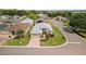 An aerial view of a charming single-story home with well maintained landscaping at 3912 Baldwin Ln, Winter Haven, FL 33884