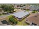 Aerial view of a charming neighborhood with well-maintained landscaping and a gray roof at 3912 Baldwin Ln, Winter Haven, FL 33884