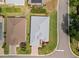 Birds eye view of a well maintained single-story home with a gray roof at 3912 Baldwin Ln, Winter Haven, FL 33884