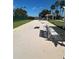 Enjoy outdoor activities on the bocce ball court with seating and a pergola near the water at 3912 Baldwin Ln, Winter Haven, FL 33884
