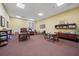 Spacious game room featuring tables, chairs, and lots of games and puzzles at 3912 Baldwin Ln, Winter Haven, FL 33884