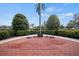 Beautifully landscaped memorial park with brick walkway and memorial monuments at 3912 Baldwin Ln, Winter Haven, FL 33884