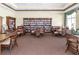 Cozy library featuring bookshelves, comfortable seating, and natural light at 3912 Baldwin Ln, Winter Haven, FL 33884