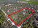Sprawling property surrounded by lush trees, providing privacy and natural beauty at 4010 Paw Paw Trl, Lake Wales, FL 33898