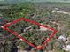 A secluded property bordered by tall trees that offers privacy and natural beauty at 4010 Paw Paw Trl, Lake Wales, FL 33898