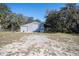 Exterior of property featuring a large barn, ideal for storage, work, or hobbies at 4010 Paw Paw Trl, Lake Wales, FL 33898