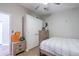 Neat bedroom offers a comfortable bed, a closet, and a nightstand, creating a cozy and organized atmosphere at 4010 Paw Paw Trl, Lake Wales, FL 33898