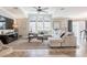 Spacious living room with large windows and comfortable seating, perfect for relaxation at 4010 Paw Paw Trl, Lake Wales, FL 33898