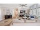 Spacious living room with tile and carpet flooring, neutral colors, and lots of natural light creates a welcoming space at 4010 Paw Paw Trl, Lake Wales, FL 33898