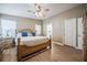 Bedroom with light wood flooring, ceiling fan and plenty of natural light at 4010 Paw Paw Trl, Lake Wales, FL 33898