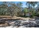 Two outbuildings offer plenty of storage or workspace in this idyllic wooded setting at 4010 Paw Paw Trl, Lake Wales, FL 33898
