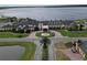 An aerial view of Lake Ashton's spectacular clubhouse and meticulously landscaped grounds at 4063 Birkdale Dr, Lake Wales, FL 33859