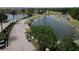 Lake Ashton aerial view with golf course, lake, and brick paver streets and lush landscaping at 4063 Birkdale Dr, Lake Wales, FL 33859