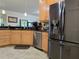 Updated kitchen featuring stainless steel appliances, dishwasher, and an open layout at 4063 Birkdale Dr, Lake Wales, FL 33859