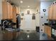 Bright kitchen features stainless steel appliances, ample counter space, and convenient storage at 4063 Birkdale Dr, Lake Wales, FL 33859