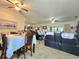 Open-concept living and dining area with tile floors, ceiling fans, and comfortable seating at 4063 Birkdale Dr, Lake Wales, FL 33859