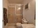 Bathroom featuring a glass enclosed shower, toilet and sink at 4229 Nandina St, Lake Wales, FL 33898