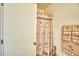 A charming bathroom featuring a shower with a decorative shower curtain and towels at 4229 Nandina St, Lake Wales, FL 33898