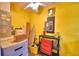 Utility room featuring storage shelves and a yellow painted wall at 4229 Nandina St, Lake Wales, FL 33898