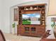 Close-up of a living room featuring a TV entertainment center at 4313 Heath Land Ln, Lake Wales, FL 33859