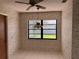 Bright dining area with decorative wallpaper and window with a nice view of the front yard at 460 Pinehurst Ct, Winter Haven, FL 33884