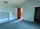 Bright main bedroom features ensuite bathroom access and a large closet, all with nice natural light at 460 Pinehurst Ct, Winter Haven, FL 33884
