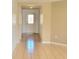 Inviting entryway with light tile flooring and a decorative glass front door at 4610 Yellow Bay Dr, Kissimmee, FL 34758