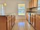 An expansive kitchen with ample counter space and modern appliances offers a functional layout at 4610 Yellow Bay Dr, Kissimmee, FL 34758