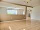 Inviting living area with tile floors and an open view of the kitchen at 4610 Yellow Bay Dr, Kissimmee, FL 34758