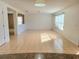 Bright living room featuring tile floors and ample natural light from large windows at 4610 Yellow Bay Dr, Kissimmee, FL 34758