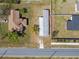 Aerial view showcasing the home's layout and surrounding neighborhood at 4957 Old Lucerne Park Rd, Winter Haven, FL 33881