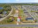 This aerial shows the location of the property near a lake in a well-established neighborhood at 4957 Old Lucerne Park Rd, Winter Haven, FL 33881