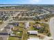 This aerial shows the location of the property near a lake in a well-established neighborhood at 4957 Old Lucerne Park Rd, Winter Haven, FL 33881