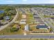This aerial shows the location of the property near a lake in a well-established neighborhood at 4957 Old Lucerne Park Rd, Winter Haven, FL 33881