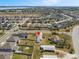 This aerial shows the location of the property near a lake in a well-established neighborhood at 4957 Old Lucerne Park Rd, Winter Haven, FL 33881