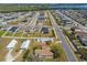 This aerial shows the location of the property near a lake in a well-established neighborhood at 4957 Old Lucerne Park Rd, Winter Haven, FL 33881