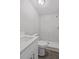 Bright bathroom featuring a marble-tiled walk-in shower, modern vanity, and wood-look flooring at 4957 Old Lucerne Park Rd, Winter Haven, FL 33881