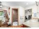 Well-lit bathroom with tile flooring, walk-in shower, and neutral decor at 5020 Broadmore Dr, Auburndale, FL 33823