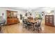 Large dining room with wood floors, traditional furnishings, and natural light at 5020 Broadmore Dr, Auburndale, FL 33823