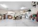 Well-organized garage with lots of storage, utility hook ups, and a clean floor at 5020 Broadmore Dr, Auburndale, FL 33823