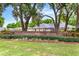 Lake Juliana Reserve entrance sign framed by mature trees and lush landscaping for a welcoming feel at 5020 Broadmore Dr, Auburndale, FL 33823