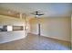 Living Room with ceiling fan, tile floors, and open to kitchen at 509 Heather Glen Dr, Winter Haven, FL 33884