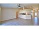Open floorplan featuring living room with tile floors and slider to kitchen at 509 Heather Glen Dr, Winter Haven, FL 33884