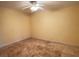 Bedroom with tile flooring and ceiling fan at 579 Saint Andrews Rd, Winter Haven, FL 33884