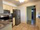 Kitchen features stainless appliances, stone countertops, and tile backsplash at 579 Saint Andrews Rd, Winter Haven, FL 33884